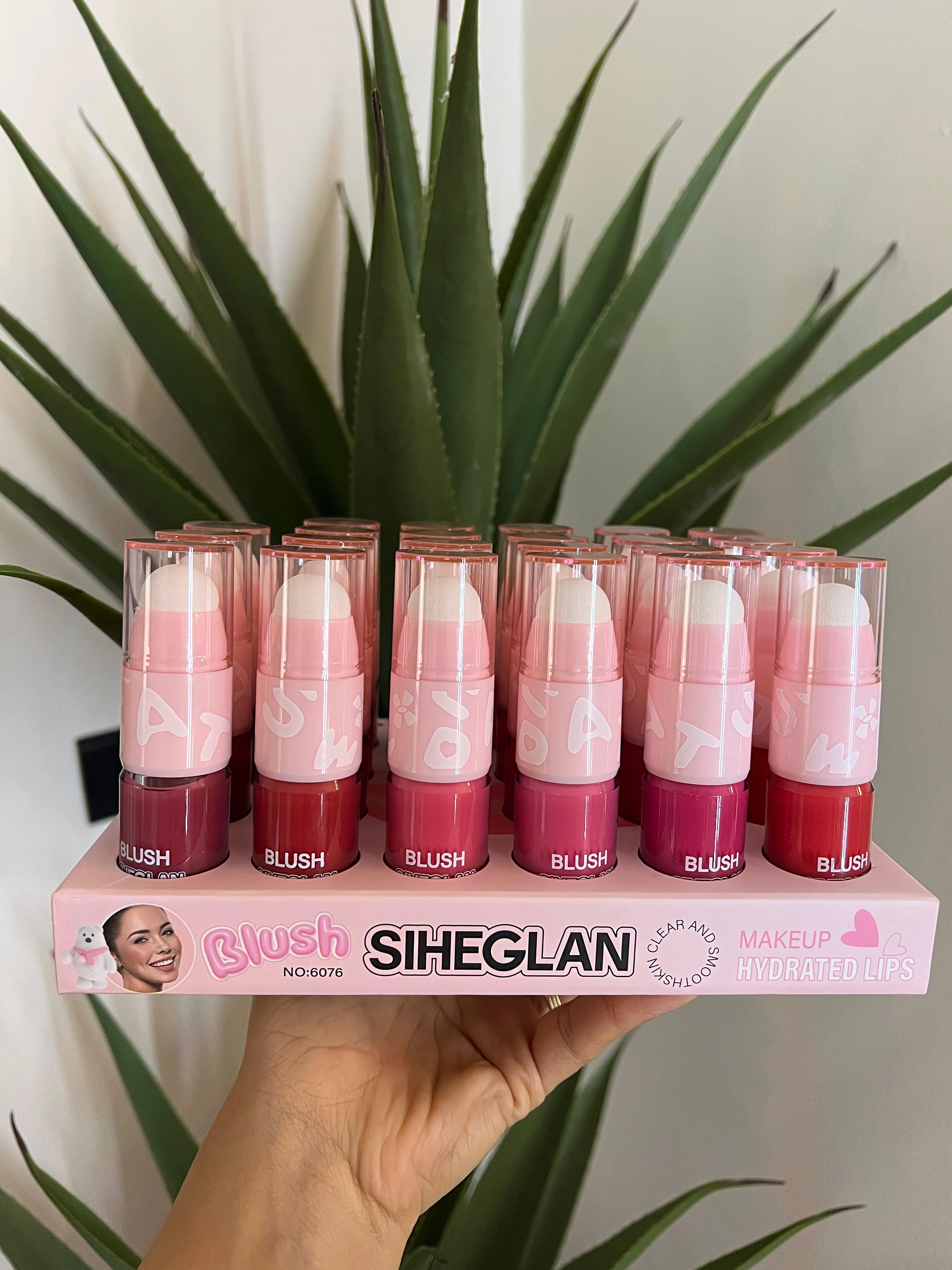 Blush with sponge on top
